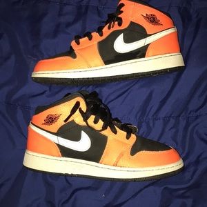 Shattered Backboard Vibes On This Air Jordan 1 Mid